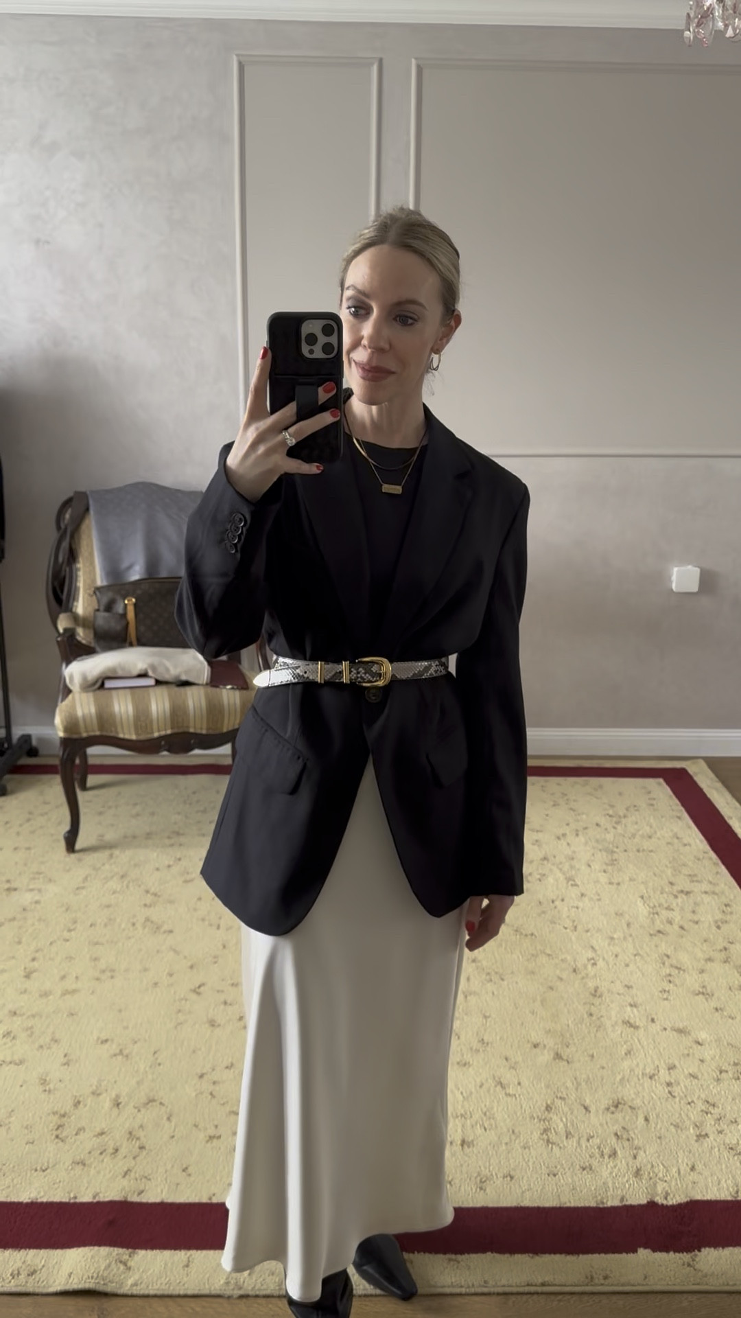 Work wear look, snakeskin belt, oversized black blazer with satin midi skirt, satin skirt with tall boots - Staud boots are 20% off right now with code SELECT20 

#LTKSaleAlert #LTKWorkwear #LTKShoeCrush