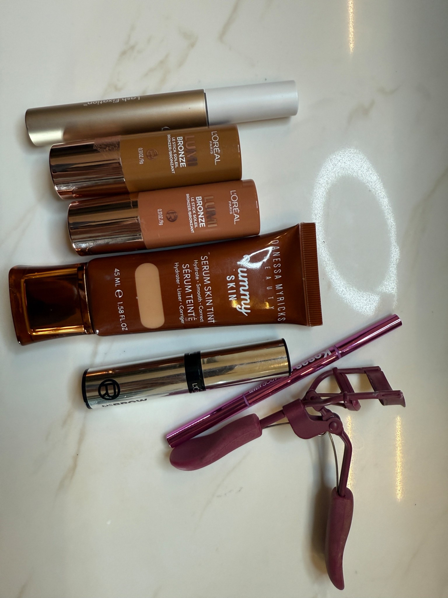Products used in this am GRWM
Lumi Bonze Le stick shaded Toasted Sunlight & Sun-kissed Rose
Bk Beauty lash curler
Kosas brow pop nano in black
Danessa Myricks yummy skin tint in shade 
Loreals brow lamination gel 


#LTKOver40 #LTKgrwm #LTKBeauty