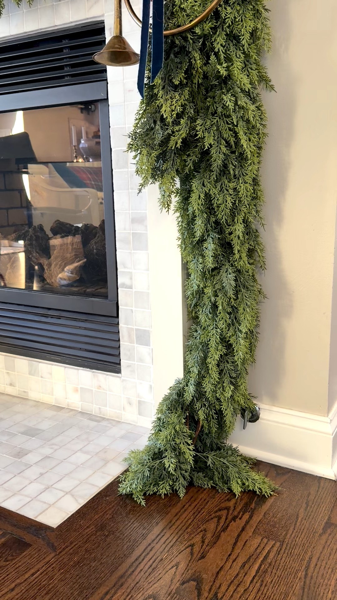 I used an extra-long garland around our fireplace this year, and it makes the whole room feel warm and festive. The length gives it a full, draped look that frames the mantel beautifully. I mixed in simple ribbon, and a few of my favorite brass pieces to keep it classic and collected. Such an easy way to elevate your holiday decor.

#LTKHoliday #LTKHome #LTKSaleAlert