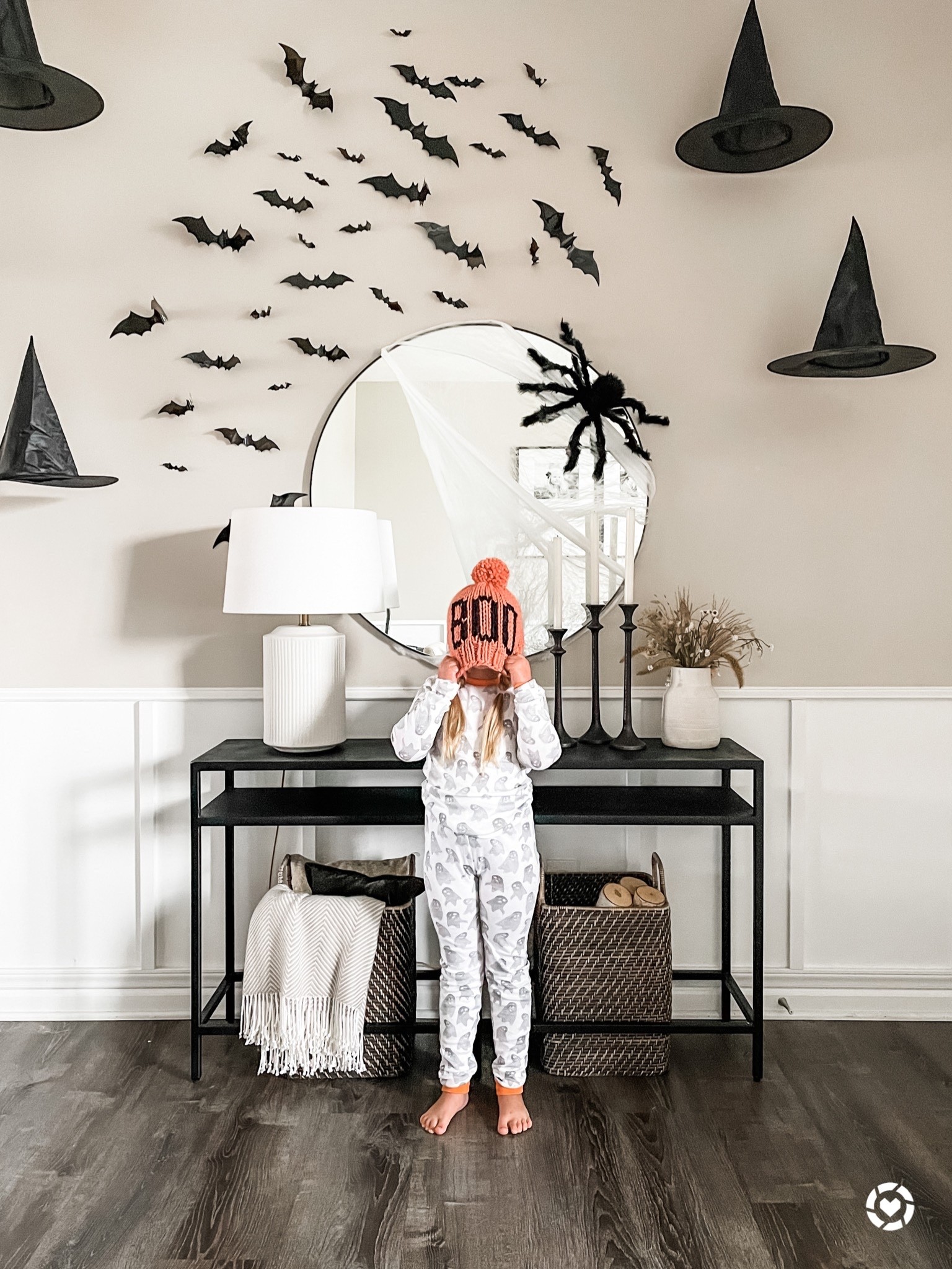 Spooky Halloween entryway
Console table, witch hat, bat decor, wall decor, Amazon finds, Target finds, mirror, lamp, vase, candle, pajamas, matching pjs, knit beanie, boo, basket, storage

#LTKhome #LTKSeasonal #LTKHalloween