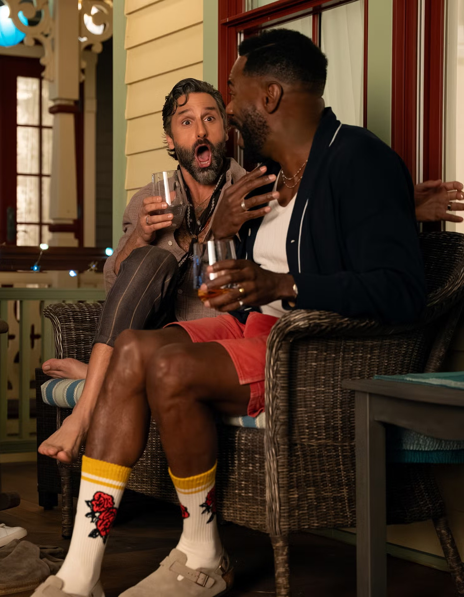 Coleman Domingo in The Four Seasons wearing Imogene + Willie socks, Birkenstock clogs, a Madewell tank, Bode cardigan, and Kapital shorts 

 