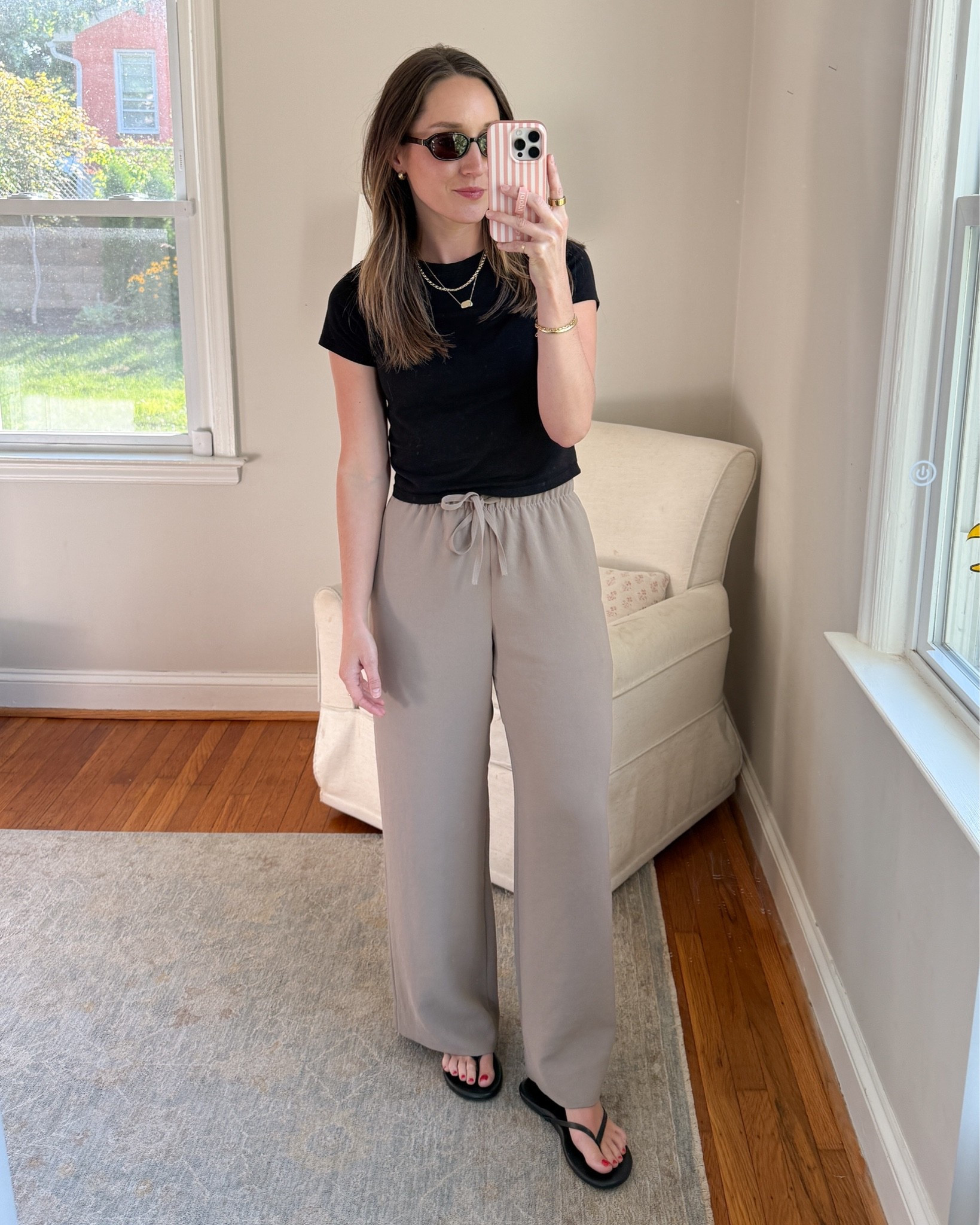 Wearing small in the pants. Regular length and I had them hemmed. Color is nomad taupe.