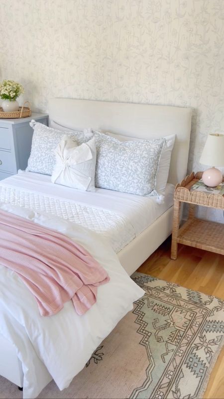 Shop our daughters calming pink and blue bedroom. Use code UPGRADE to get 20% off these pieces from Serena and Lily. Bedroom furniture, girls bedroom, rattan side table, nightstand, coastal bedroom, pottery barn kids, blue dresser, pink throw blanket, white upholstered bed, organic bamboo bedding, white quilt, white bedding, pink and blue vintage rug 

#LTKSale #LTKhome #LTKfamily