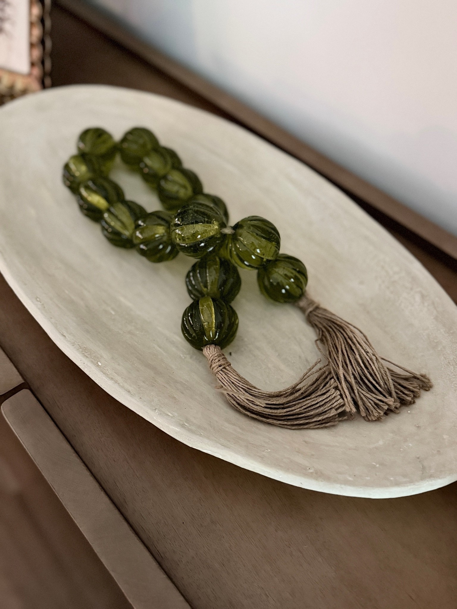 Just look at the gorgeous color of these glass beads! They’re such a heavy, high-quality piece and add the prettiest touch to your decor. I used mine layered on one of my trays on my sideboard and love the texture and color they bring to the space.