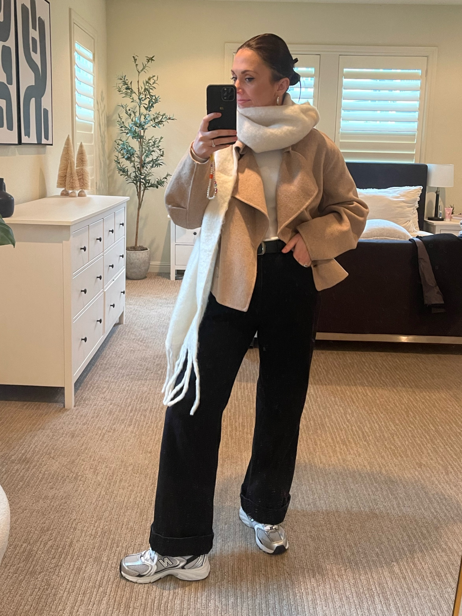 Winter outfit 🤍
All items from a capsule wardrobe 
Start with your base 
Uniqlo ribbed long sleeve , Target black bag jeans. (Went up a size for oversized look) Foot Locker new balance 530s warm cream scarf and accessories to top it off 

#LTKshoecrush #LTKSeasonal #LTKstyletip