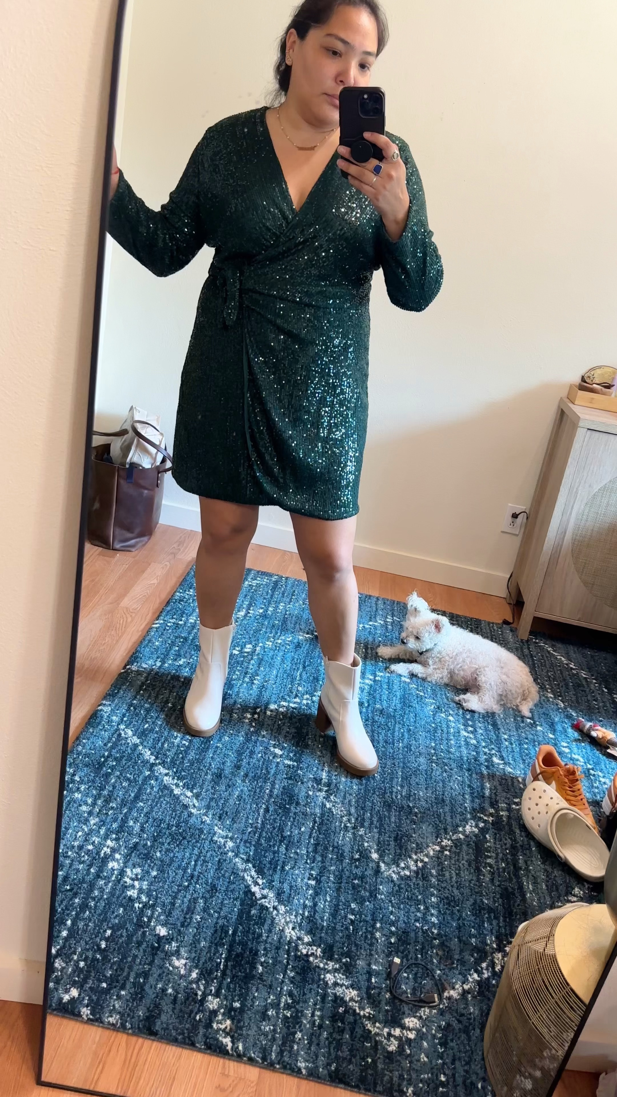 One of my favorite night time looks. The boot is the perfect contrast and gives you the tiniest western touch that I love. The sequins dress is light so no getting toasty during cocktail hour. 

#LTKmidsize #LTKstyletip #LTKHoliday