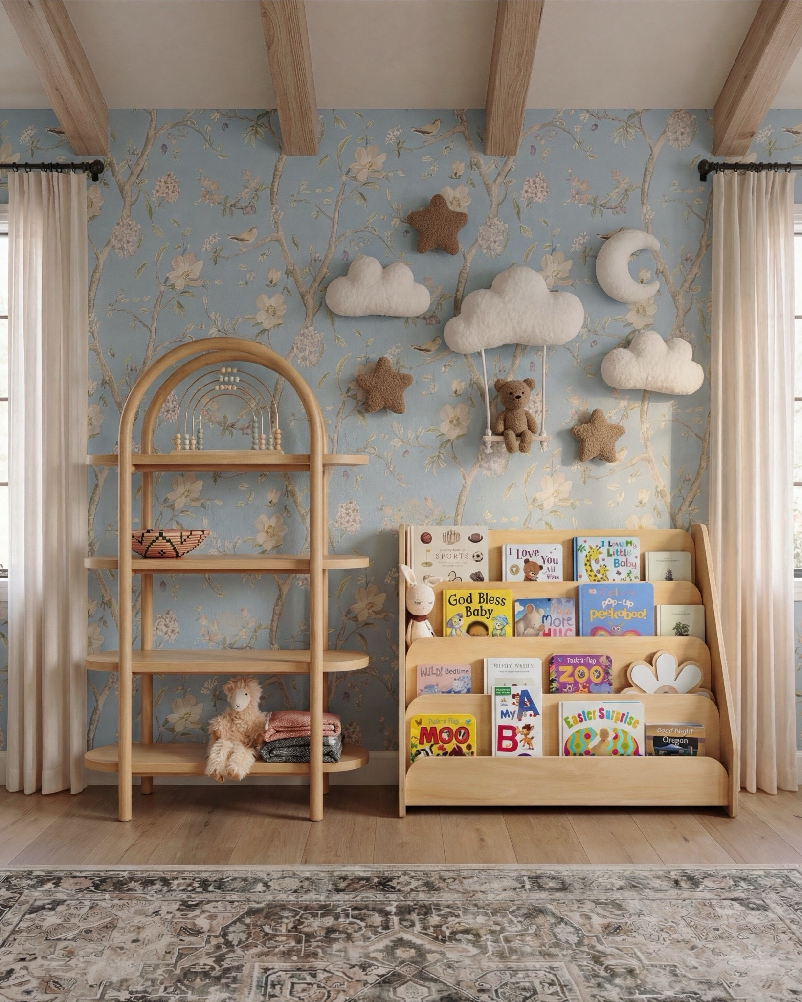 This nursery feels soft, whimsical, and thoughtfully layered—designed to grow with your little one while still feeling elevated and calm. The powder blue floral wallpaper sets a dreamy backdrop, while light wood beams and furniture keep the space warm and grounded. Natural textures, rounded shapes, and gentle curves make the room feel cozy, playful, and serene all at once.

The styling is sweet but intentional—plush wall decor, open shelving for toys and books, and a mix of classic wood pieces with soft textiles create a nursery that feels curated, not cluttered.

Shop the Look:
• Light blue floral wallpaper
• Natural wood exposed ceiling beams
• Solid wood crib (warm oak tone)
• Neutral crib mattress + fitted sheet
• Knit baby blanket (soft brown)
• Vintage-inspired area rug (muted blue + beige)
• Wood dresser with woven drawer fronts
• Round gold-framed wall mirror
• Brass table lamp with white shade
• White boucle accent chair
• Round upholstered pouf (cream)
• Wooden toy shelving unit
• Front-facing wooden book rack
• Children’s board books (colorful covers)
• Plush teddy bear
• Soft cloud wall decor
• Star-shaped wall pillows (neutral tones)
• Crescent moon wall decor
• Beaded rainbow toy
• Sheer white curtain panels
• Black curtain rod with rings
#LTKSaleAlert

#LTKsale #LTKhome