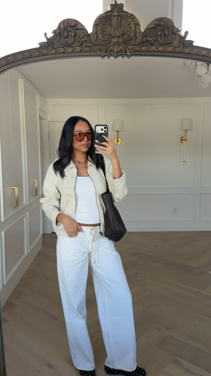 Woven tote on SALE!! Wearing a S tank, S jacket, and 27 long jeans 

summer outfit, summer fashion, fall transitional outfit, casual outfit, lunch outfit, madewell sale, sale alert, white jeans, bomber jacket