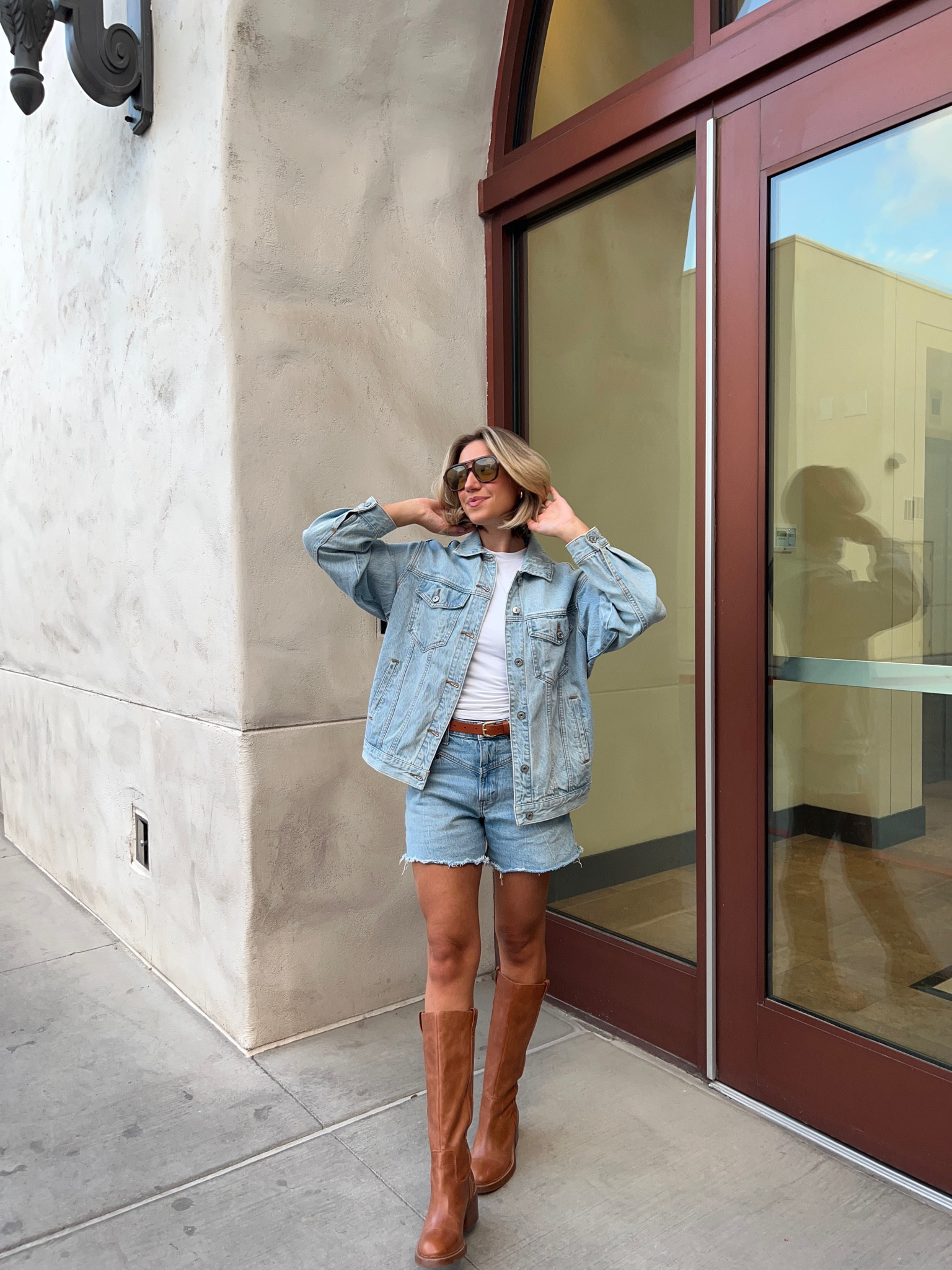 Fall outfit, fall style, Jean jacket, denim jacket, white tee, white t-shirt, denim shorts, Jean shorts, Canadian tuxedo, brown boots, fall boots

#LTKStyleTip #LTKSeasonal