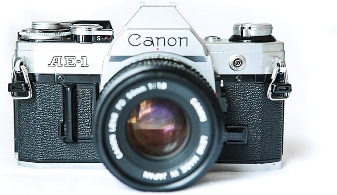 Vintage Canon AE-1 35mm SLR Camera with 50mm 1:1.8 Lens (Renewed) | Amazon (US)