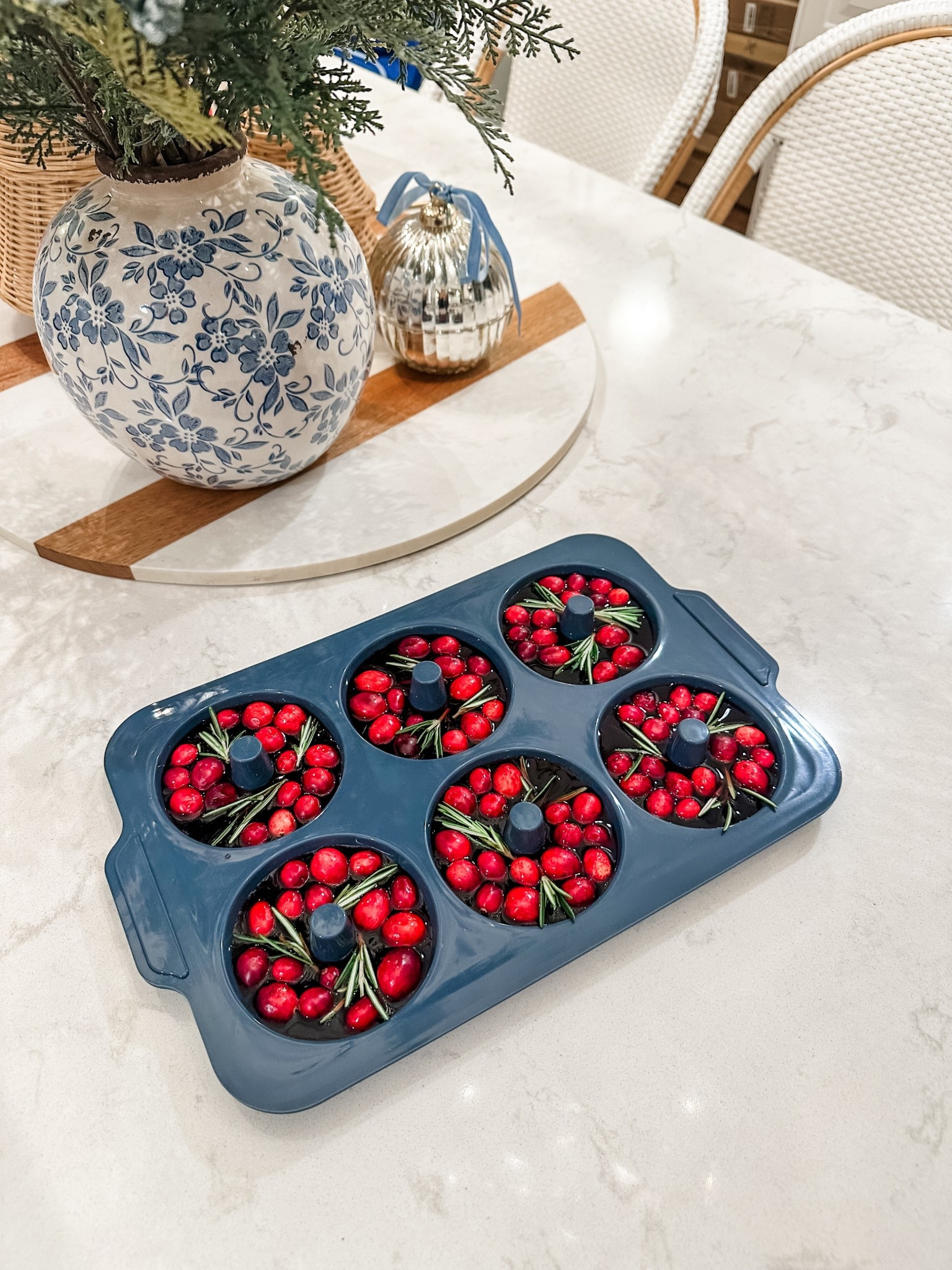 Making wreath pomegranate ice cubes for some festive Christmas drinks 🥂 Add fresh cranberries, pomegranate juice and fresh rosemary to silicone donut molds and freeze!

#LTKHome #LTKSeasonal #LTKHoliday