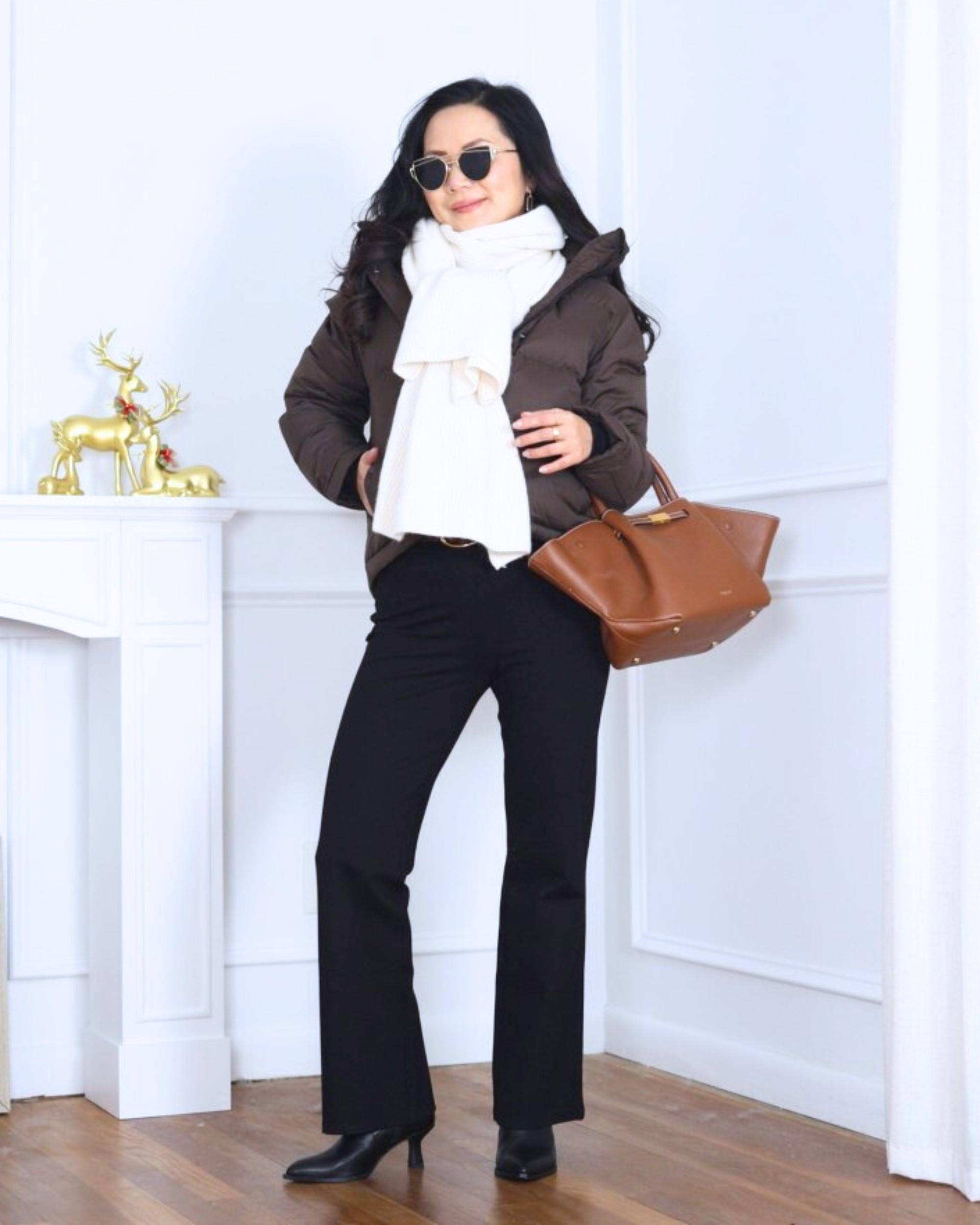 There’s something about pairing a sleek black tank with Gap’s white wide-leg pants—the contrast feels modern yet effortless. I’m 5’2” and wearing size S, and adding my Quince bag and heels pulls the whole look together perfectly. I’m 5’2, wearing size XS.

#LTKOver40 #LTKootd #LTKPetite