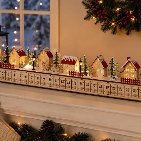 Kurt Adler 6.7-Inch Light-Up Christmas Village With Advent Calender | Amazon (US)