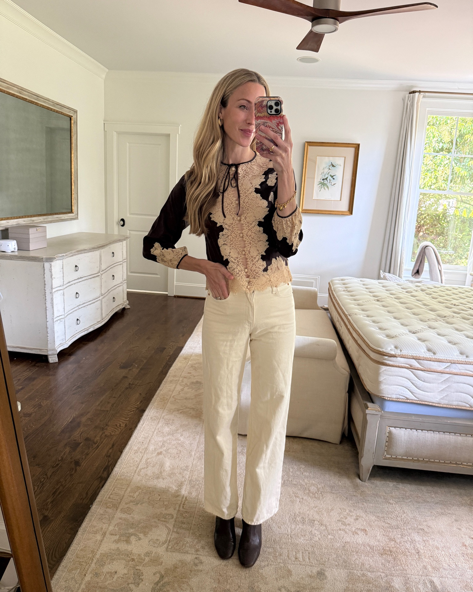 Size XS top (comes cream and as a cami too, similar for less also linked), jeans are only available on SLVRLAKE website (similar linked). Booties no longer available in leather; suede option and similar linked.

Fall blouse, fall top, brown top, brown blouse, white jeans, ecru jeans, cream jeans

#LTKootd #LTKgrwm #LTKSeasonal