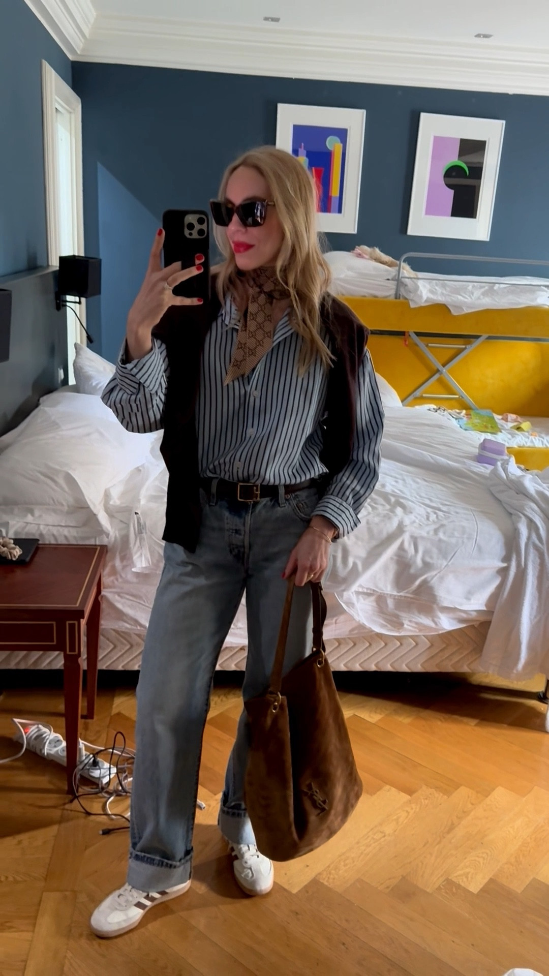 Look of the day, travel style, @Zara striped shirt, @Levi's cuffed baggy 90’s jeans, Gucci scarf, Saint Laurent suede bucket bag, European vacation 

#LTKTravel #LTKootd #LTKSaleAlert