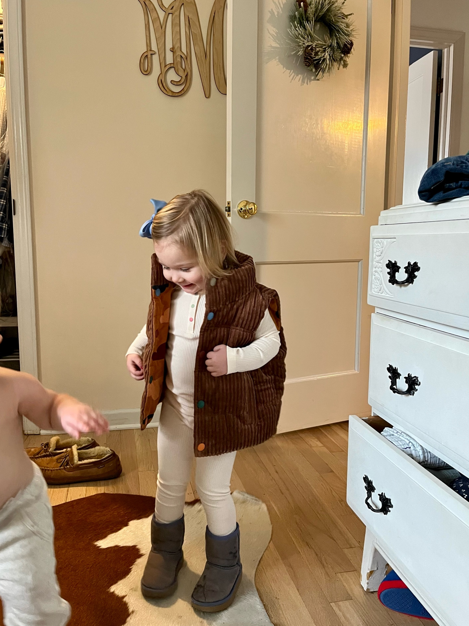 The cutest play outfit! Ivory ribbed legging and top set with the sweetest colorful snap buttons and brown corduroy vest with similar snap buttons. 

Everything is true to size  

Her exact color of boots are old, I found them on Poshmark. 

#LTKfamily #LTKkids #LTKSeasonal