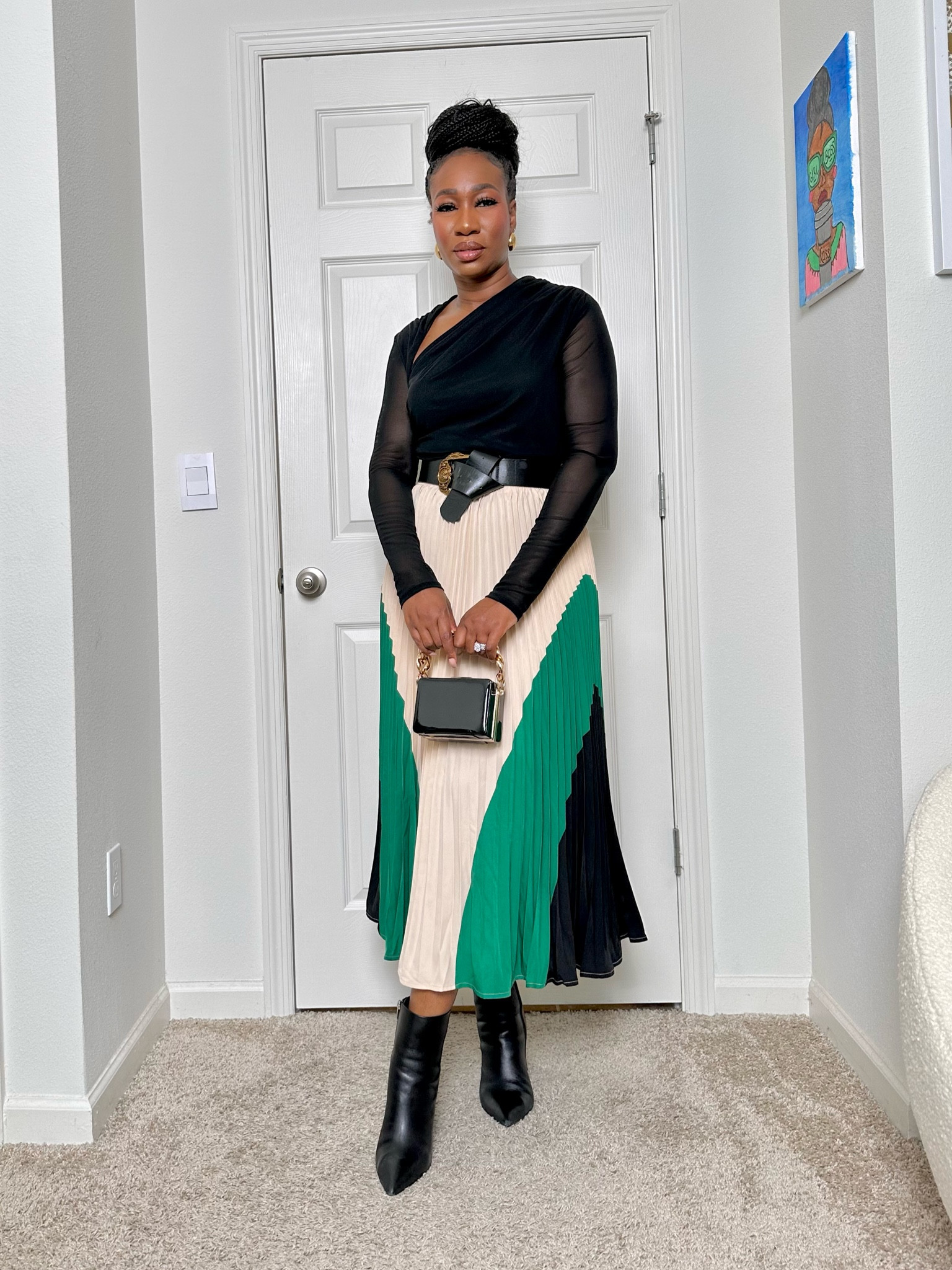 A midi pleated skirt paired with booties and a nice top. Such a great combo for fall. Wearing a medium top and medium skirt. 

#LTKSeasonal #LTKstyletip