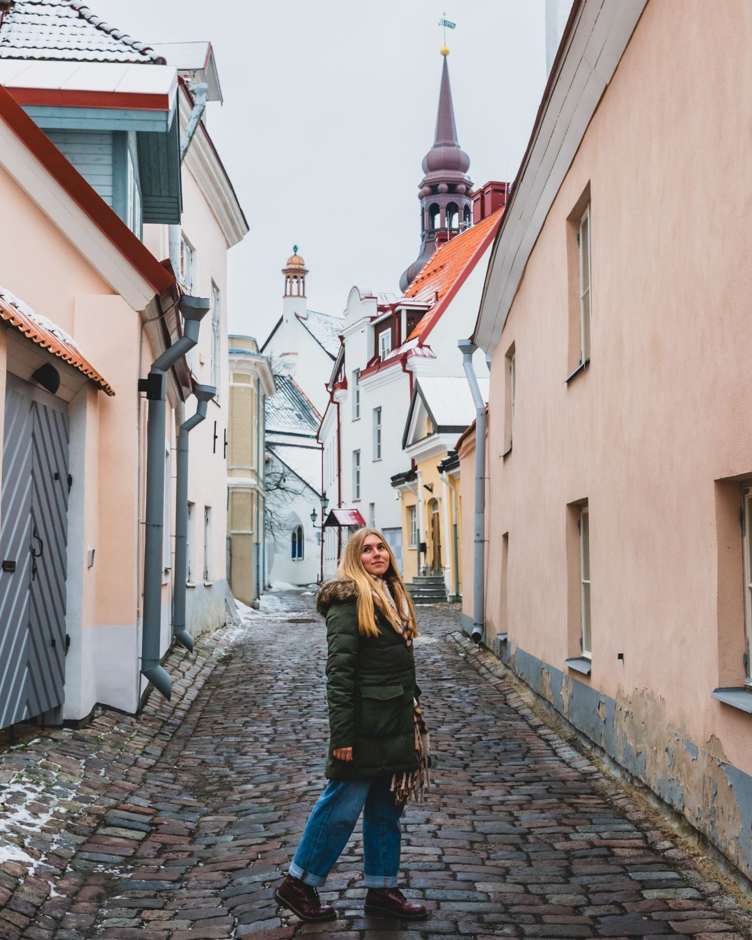 Exploring quiet streets in the heart of winter. This coat, scarf, and boot combo kept me warm the entire trip! 

 #LTKTravel