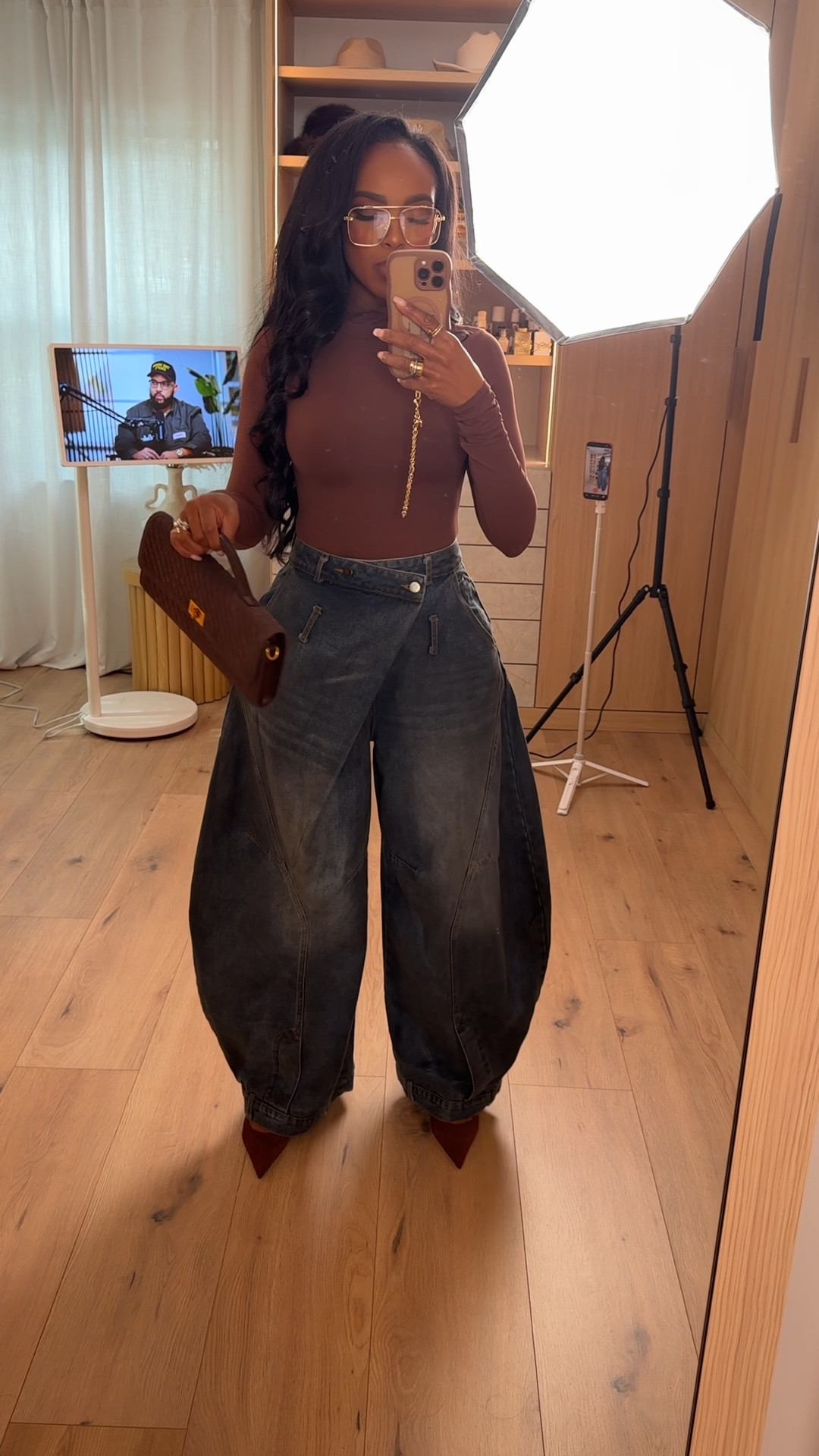 A statement look built around bold, sculptural denim — elevated by a sleek fitted top and rich brown accessories. The dramatic shape of the jeans does all the talking, while the clean silhouette up top keeps everything balanced and chic.

Perfect for casual nights out, fashion-forward daytime looks, and elevated weekend style.

📏 Sizing: Wearing Small | Jeans 27 Long | Height 5'4" | 138 lbs | 34D | 27" waist | 40" hips

Tap to get details.

Wide-leg denim outfit ideas, brown top styling, chic modern streetwear, elevated casual look inspiration.

Follow me on Instagram and YouTube @kiras

#LTKootd #LTKvlog