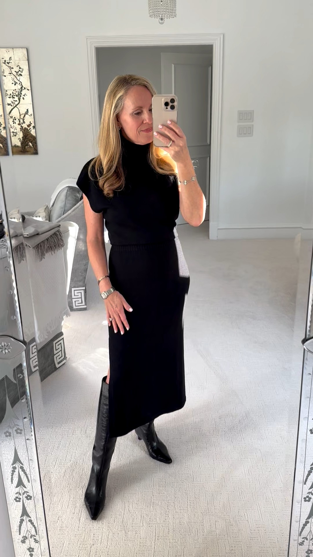 The most flattering black turtleneck sweater dress with cap sleeves from Ramy Brook
Fits TTS 

#LTKOver40 #LTKdayinmylife #LTKootd