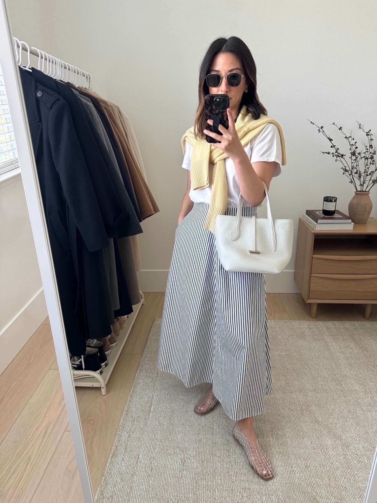 Everlane striped midi skirt. This skirt is incredible. Not too much fabric, great length, and has pockets. Just size down. On sale!

Everlane skirt 0. I need the 00
Everlane tee medium. I size up 2 sizes. 
Everlane sweater xs
Amazon Jellies 5.5
Little Liffner bag (old)
Le Specs sunglasses
J.Crew earrings

Summer outfits, summer style, petite style 


#LTKShoeCrush #LTKPetite #LTKSaleAlert