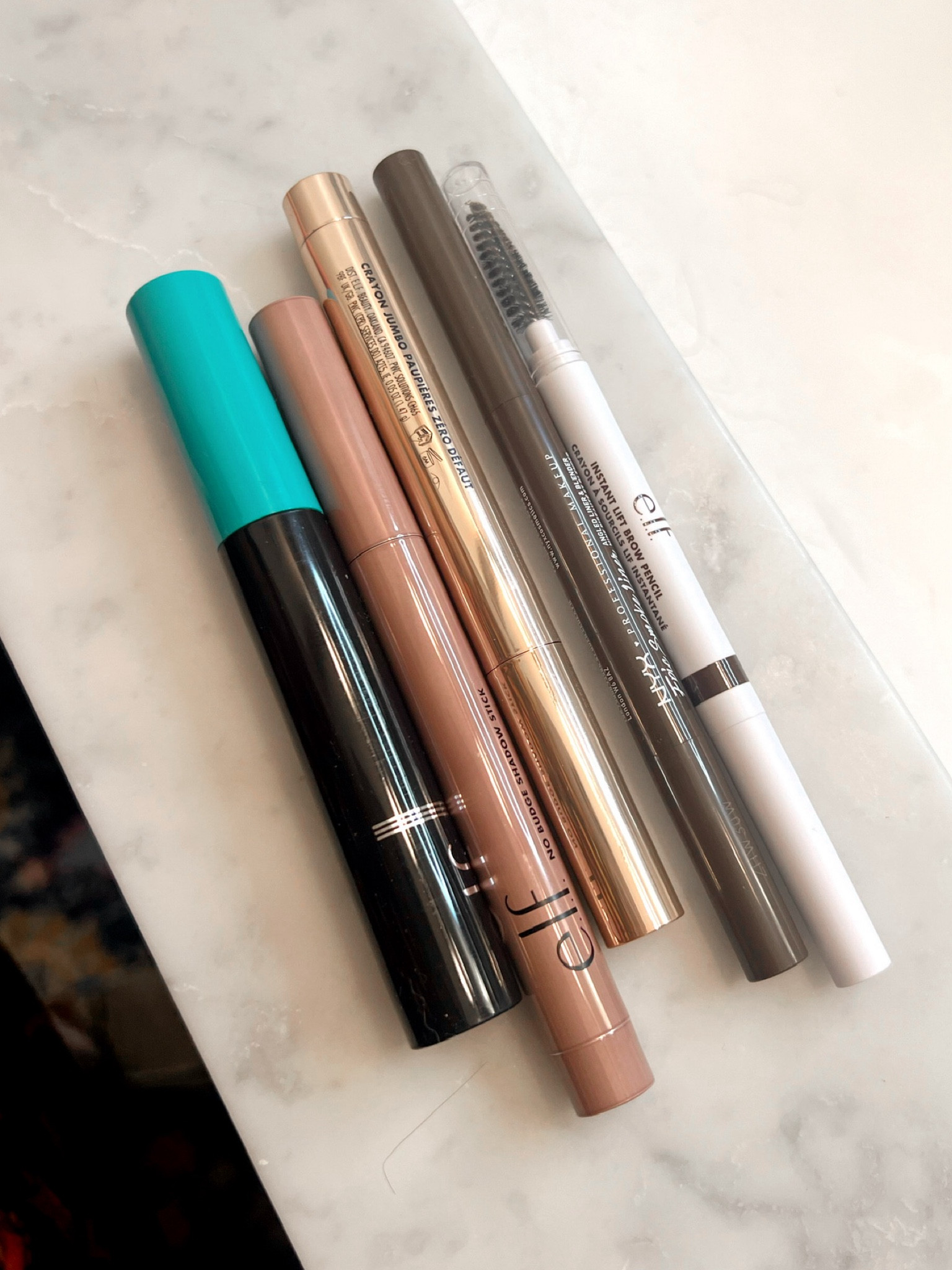 5 MIN DAYTIME APPROVED SMOKEY EYE 👁️👌 I seriously am always so intimidated by the phrase “smokey eye” but I LOVE these products and how subtle they are! Bonus… everything here is under $12!!!

STEPS: 
1. NO BUDGE STICK COLOR: CHAMPAGNE CRYSTAL 
2. NO BUDGE STICK COLOR: MAGNETIC PULL 
3. EPIC SMOKE LINER COLOR: MOCHA MATCH 
4. INSTANT LIFT BROW PENCIL COLOR: DEEP BROWN 
5. XTENDR TUBING MASCARA: DEEP BROWN 

#LTKFindsUnder50 #LTKBacktoSchool #LTKBeauty