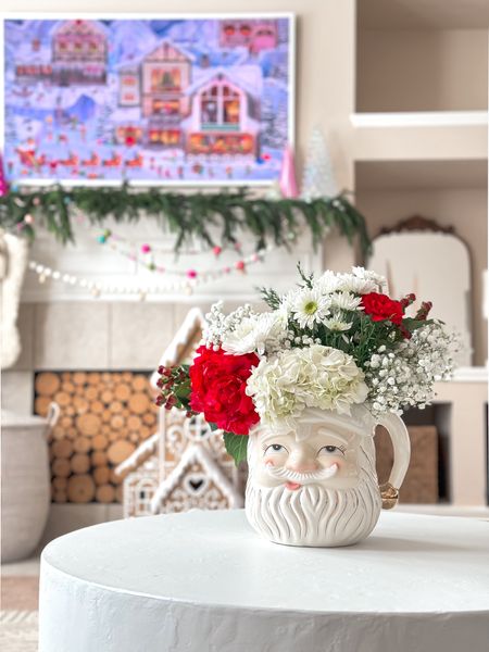 Turned this Papa Noel pitcher into a vase.  Makes for cute Christmas Decor.

#christmas #papanoel #glitterville #christmascenterpiece #christmasideas #christmasdecor #holidayhome #home 



#LTKHoliday #LTKhome #LTKfamily