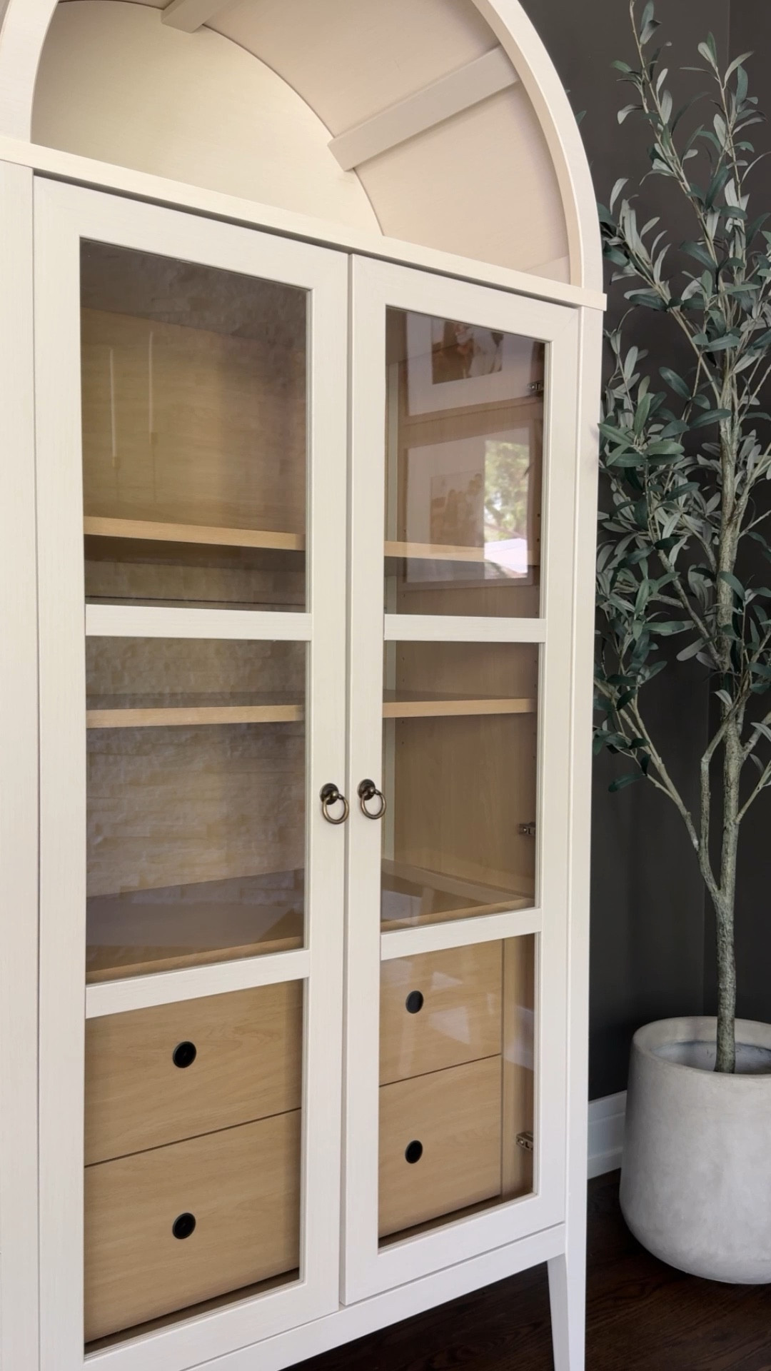 My favorite arched cabinet now comes in a larger version!! This is by far one of 2024’s top sellers, and one of my favorite purchases too. Provides a luxe look without being overly expensive. Now comes in a 74” H by 39” L size compared to mine at 71” H by 31” L. 

#LTKHome