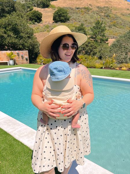 Sunshine time with my little babe. My favorite Anthropologie polka dot mini dress size large. Had pockets and comes in other prints/colors too! Target $15 sunglasses wide face friendly. Favorite baby carrier from wild bird in the large-4x size. Hat is old madewell last year - linking similar from this year - use code LONGWEEKEND for 25% off. Josie’s cute gap hat is  40% off. 

#LTKbaby #LTKmidsize #LTKSeasonal