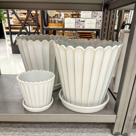 These white scalloped planters are so unique! The built in saucers are perfect for draining your plants indoors on a shelf or outdoors on the patio. Comes in 3 different sizes. 



#LTKhome #LTKfindsunder50
