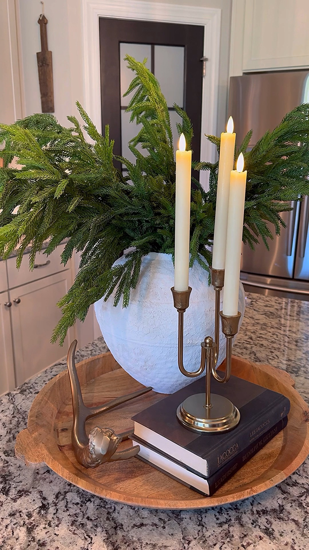 Holiday Tray #2

I used 6 Norfolk Pine Stems in this arrangement. I love the antique brass decor. It pops against the green☺️.

Large wood tray, vase, Norfolk pine stems, pine stems, black staging books? Antique brass candelabra, flameless tapers, gold antler

#LTKSeasonal #LTKVideo #LTKHoliday