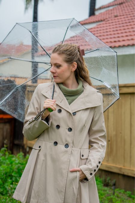 Rainy day outfit | clear collapsible umbrella | long tan trenchcoat for rain | fleece turtleneck sweater | simple cold weather outfit

#LTKSeasonal #LTKstyletip #LTKfindsunder50