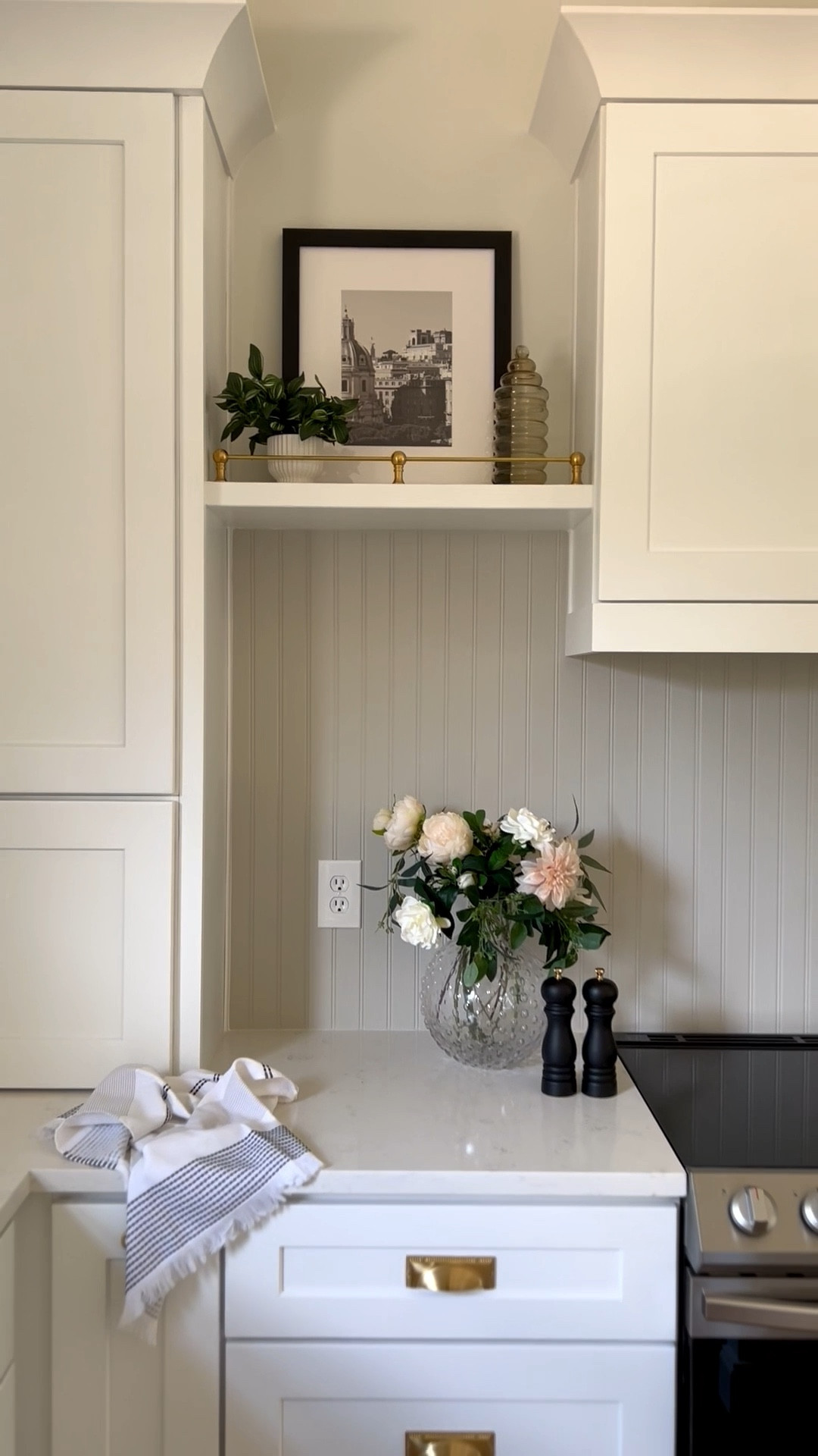 Evening kitchen reset: I love taking a few quiet minutes to clean and style the kitchen so mornings start calm. This corner feels so pulled together with black & white tones, a brass shelf railing, aesthetic salt and pepper shakers,  Turkish kitchen towels, and a statement vase. Small touches like these make the kitchen feel organized, styled, and inspiring every day. 

#LTKFindsUnder100 #LTKHome #LTKSaleAlert