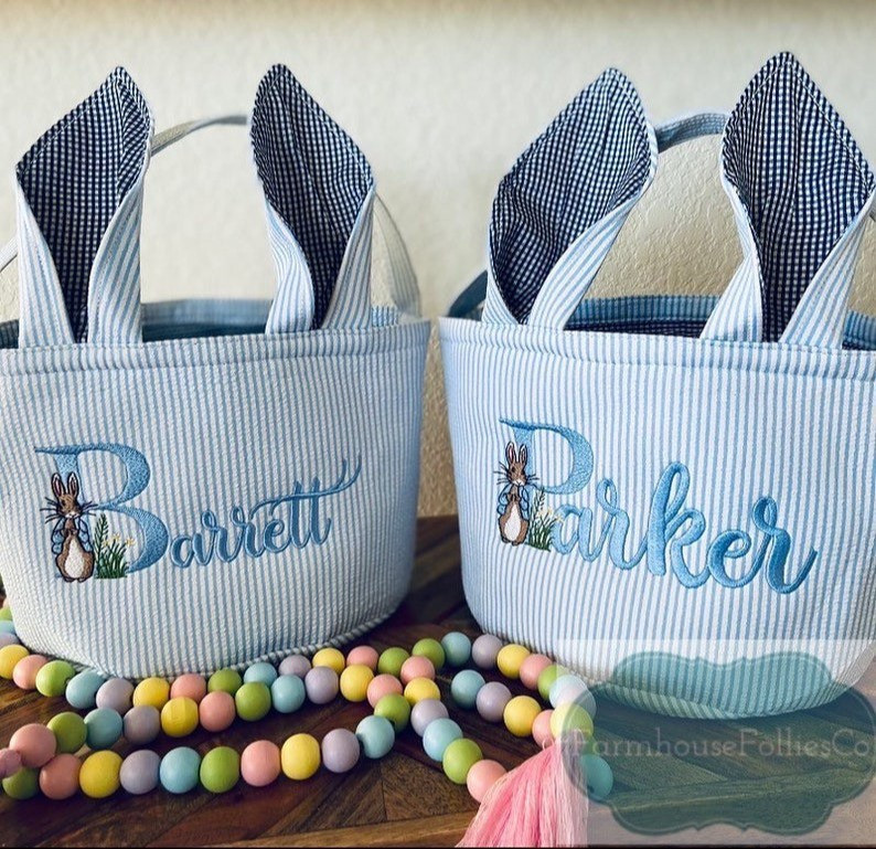Soft, sweet & personalized just for him 💙🐰 This custom name Easter basket is perfect for egg hunts, spring gifting & baby boy’s first Easter celebration. A timeless keepsake bunny tote!#PersonalizedBlueBasket #EasterBunnyBasket #BabyFirstEaster #CustomKidsBasket #EmbroideredEaster #EggHuntBasket #ToddlerBoyGift #InfantBasket #SpringGiftGuide #BabyBlueStyle #BoysEasterIdeas #SeersuckerBasket #GinghamEaster #PlushEggBag #CustomNameBunny #CottonRopeTote #Easter2026Ready #KidsHolidayGift #NeutralSpringGift #BabyBoyKeepsake

#LTKSeasonal #LTKSaleAlert #LTKmomlife