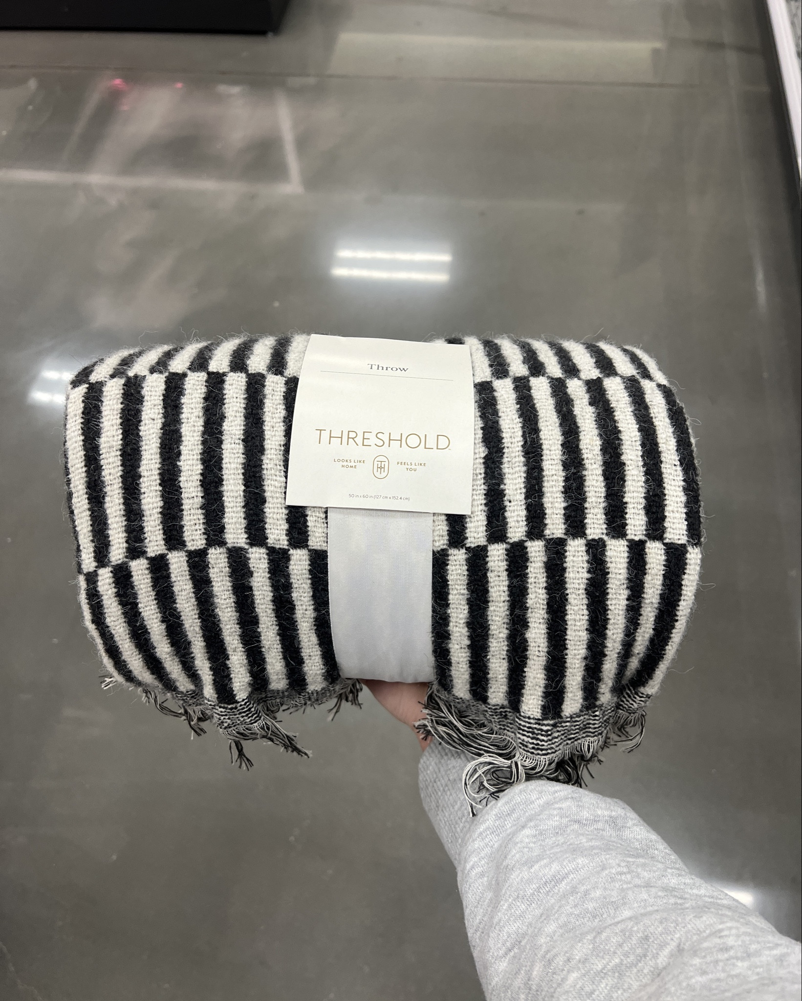 Gorgeous throw blanket for Fall and Halloween! 🖤🤍

Lend a warm, cozy embrace to your movie nights, cold outdoor evenings or relaxation at home with this Oversized Woven Linework Throw Blanket from Threshold™. This oversized throw blanket is woven from lightweight, recycled polyester-blend material for comfort and warmth. It boasts a black linework pattern with fringe detailing on the edges for a classic look that blends effortlessly with any decor style or color palette.

Threshold™: Looks like home, feels like you.