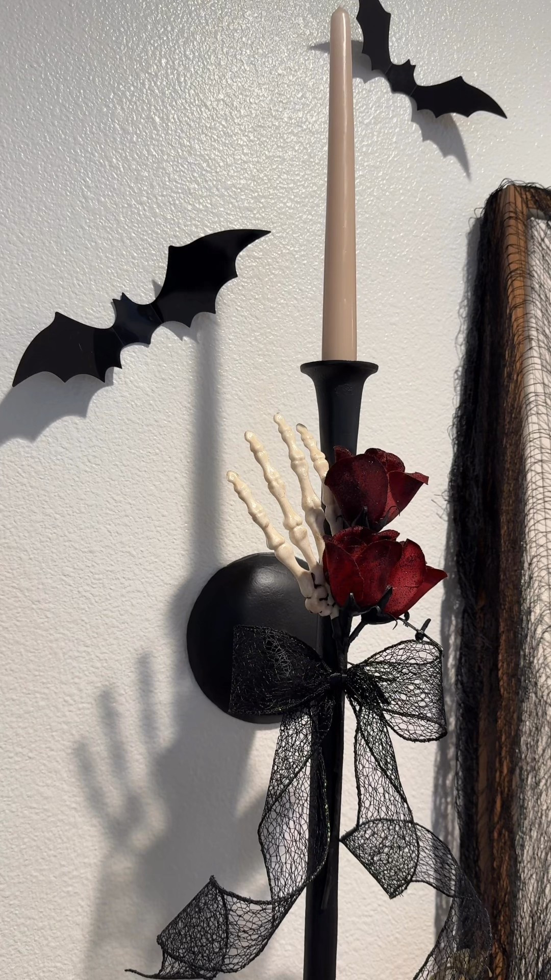 Hands down the cutest skeleton hand with roses stem pick attacked to my wall sconces  

#LTKHalloween #LTKSeasonal #LTKHome