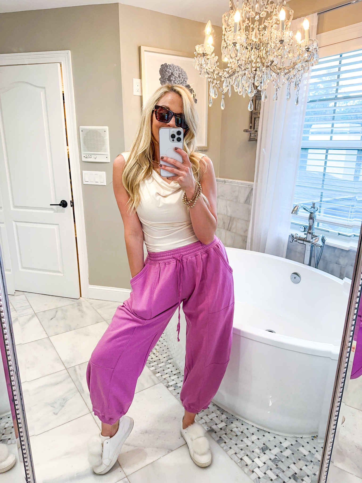 Wearing the most amazing sweat pants ever not to mention this color!!! Super cute street wear fit that can be dressed up or down !! Wearing a size XS in the pink sweats , size XS in the white top , shoes are from Sam Edelman (sold out but linked similar) and sunnies from my fuse launch line !! 
Use my code : BONNIE30 for 30% off Anthro
Code : BONNIE for 10% off sunnies 
Code : GIFT30 for 30% off shoes 

#LTKHoliday #LTKSaleAlert #LTKSeasonal