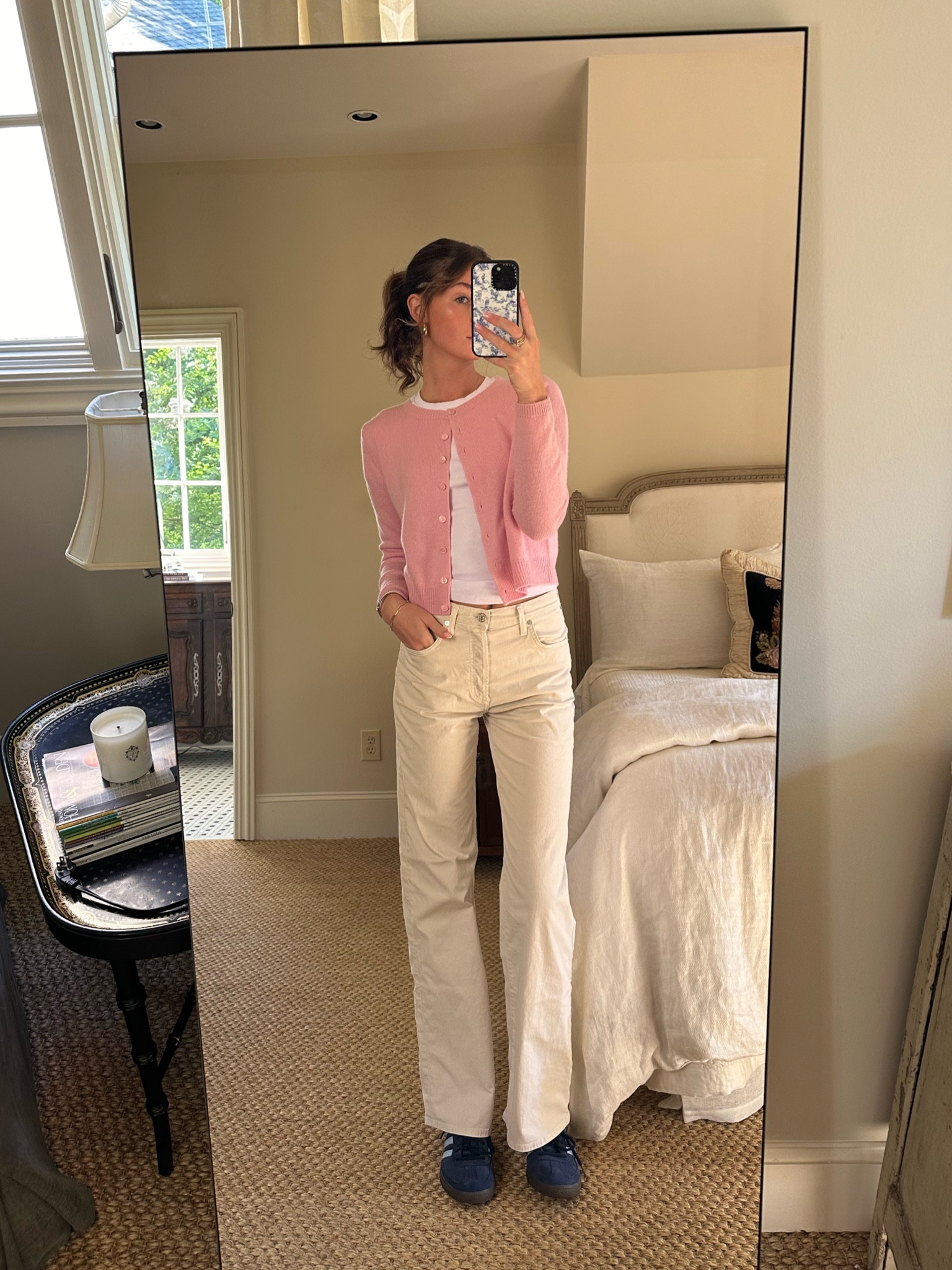 Pink button down cartigan with a white t shirt, ivory khaki jeans, and blue adidas. Sweater is size small and jeans are 26. Work outfit. Summer outfit. Travel outfit. Jeans outfit. Cartigan outfit. Elegant outfit. Europe outfit. London outfit. Italy outfit. France outfit #LTKSummerSales

#LTKworkwear #LTKtravel #LTKstyletip