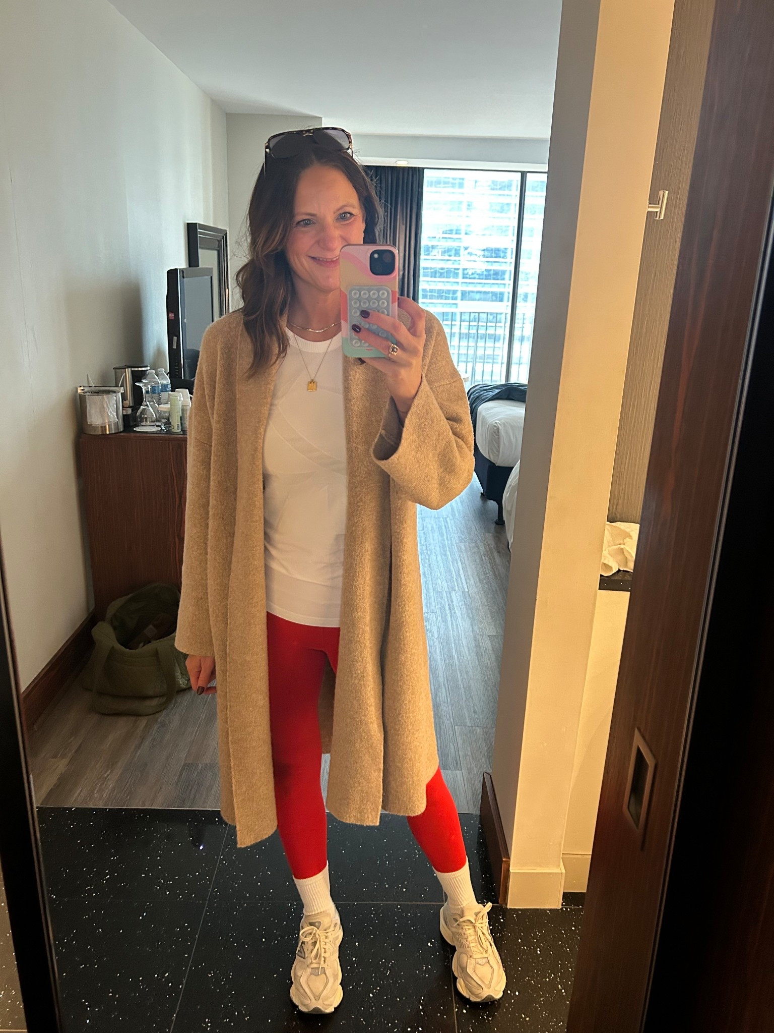 Not the best lighting in this hotel room but these leggings I shared yesterday in my Amazon sale collage are some of my favorite. I wear them to Pilates or like this with a sweater and sneakers for a fun pop of red ❤️ They come in tons of colors including black! 

#LTKCyberWeek #LTKHoliday #LTKootd