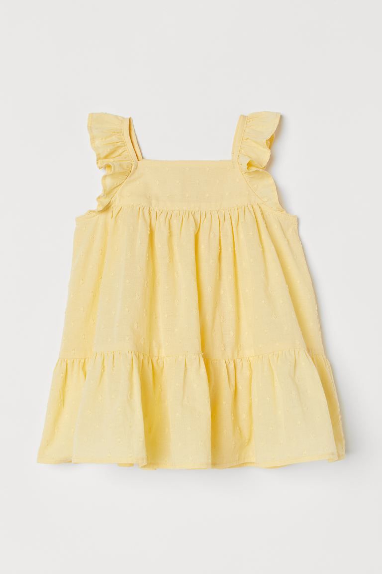 Flared, knee-length dress in airy, woven cotton fabric with ruffles over shoulders. Square neckli... | H&M (US)