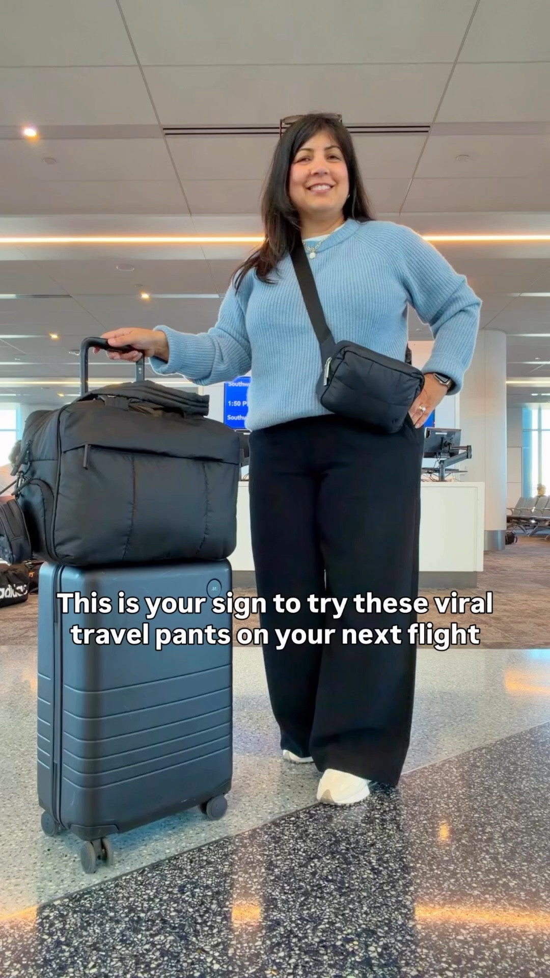 Travel outfit! These viral pants from Aritzia live up to all the hype! Great for travel, workwear, everyday wear and going out! Easy to transition from day to night by just changing your shoes. These pants work with flats, heels, sneakers and boots. They’re super comfortable and don’t wrinkle much so they transition really well from a long flight to walking around your destination. Available in regular, short and tall lengths and lots of colors! Also loving this soft Quince cashmere fisherman’s sweater. Such a great layer while traveling! 

Quince cashmere sweater size large. Aritzia pants size large short. New Balance 327 sneakers. Kendra Scott necklace. Lululemon belt bag. CALPAK Luka Duffel tote bag. Monos carry-on suitcase. 

Airport outfit, winter capsule wardrobe

@Quince @Aritzia @CALPAK @lululemon 

#LTKTravel #LTKootd #LTKOver40