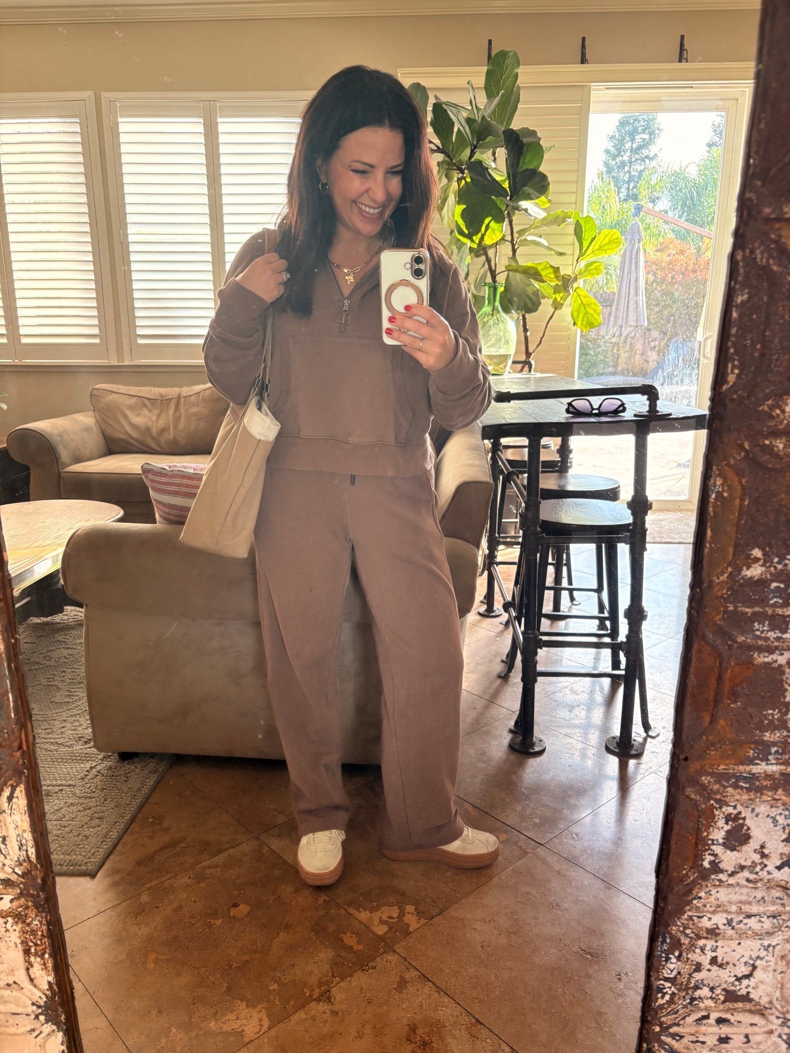 Early morning basketball tournament. No breaks between soccer and basketball! Love this chocolate brown cozy two piece set. My tote bag is awesome. It carries everything for school, errands or sports. So many pockets and pouches, even holds a laptop. 

#LTKTravel #LTKmomlife #LTKPetite