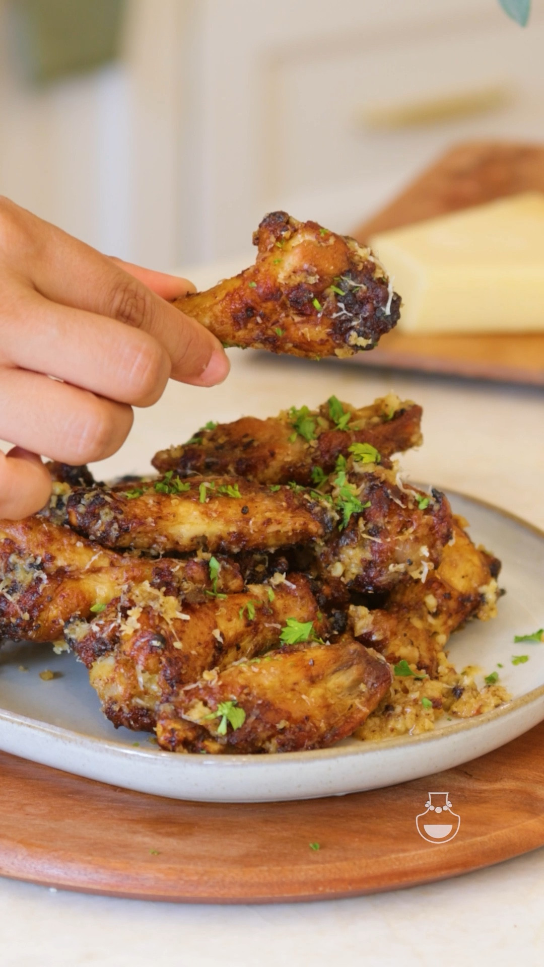 Crispy Garlic Parmesan Wings that I made in the air fryer with the tastiest sauce ever! This recipe is a must especially if you have friends or family over! #airfryerchicken #chickenrecipes #dinnerparties 

#LTKHoliday #LTKParties