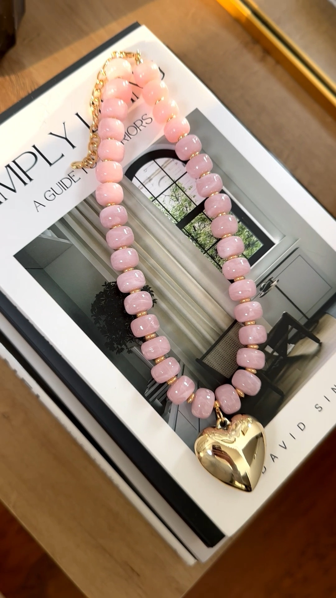 Beaded necklace with gold heart charm. The perfect summer accessory. 🤩

#LTKootd