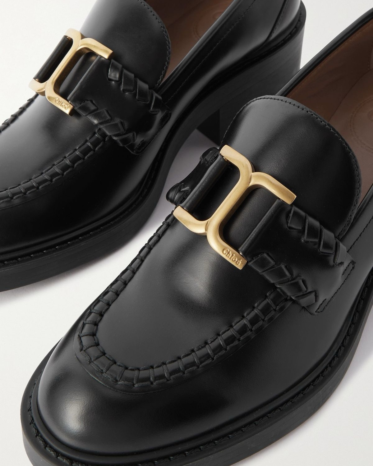 Step into timeless style with Chloé's Marcie loafers in sleek black leather. Priced at €877, and now with 25% off for orders over €500 using code CVD25. Enjoy free delivery on purchases over €200 and hassle-free returns.

#LTKxNSale #LTKShoeCrush #LTKSaleAlert