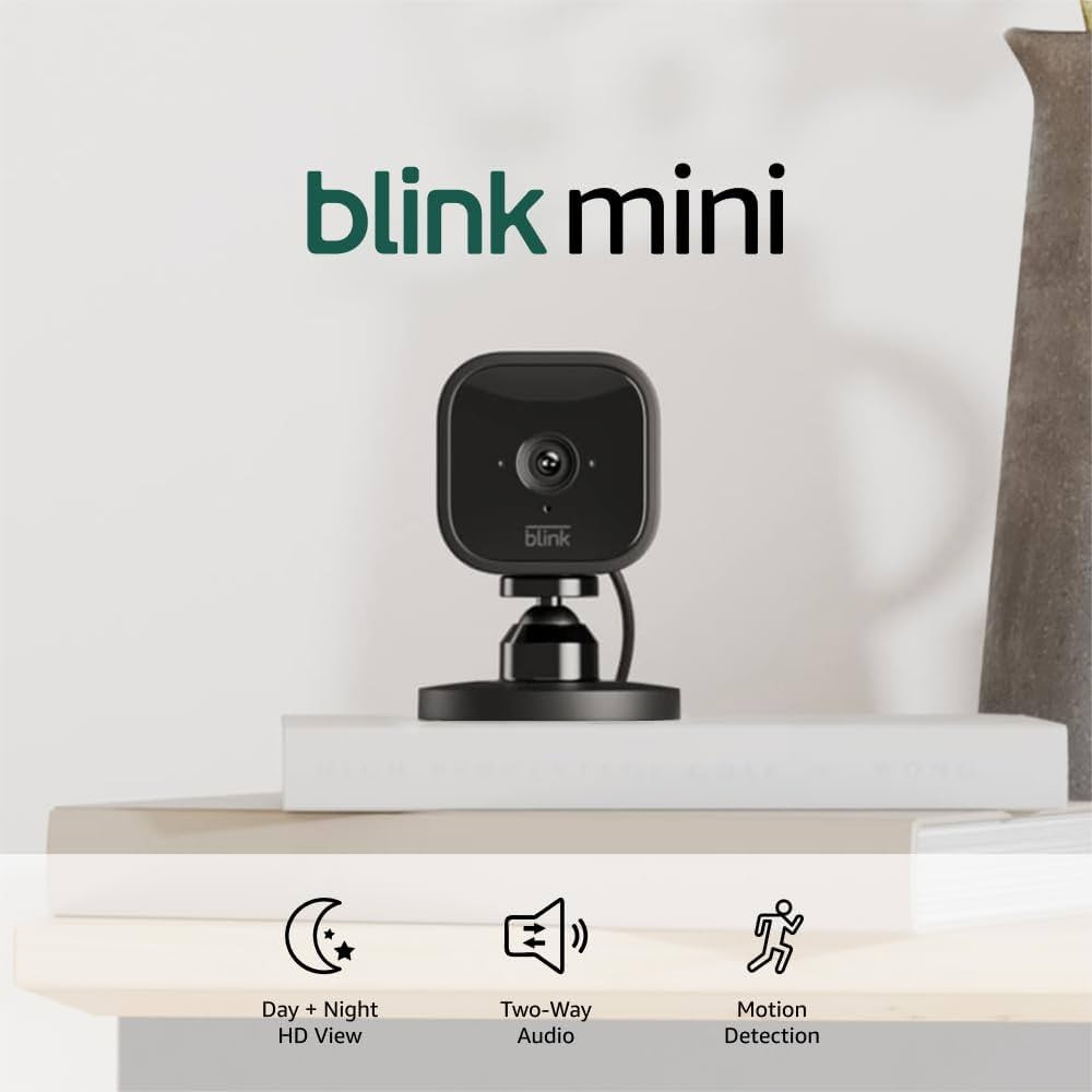 Blink Mini - Compact indoor plug-in smart security camera, 1080p HD video, night vision, motion d... | Amazon (US)