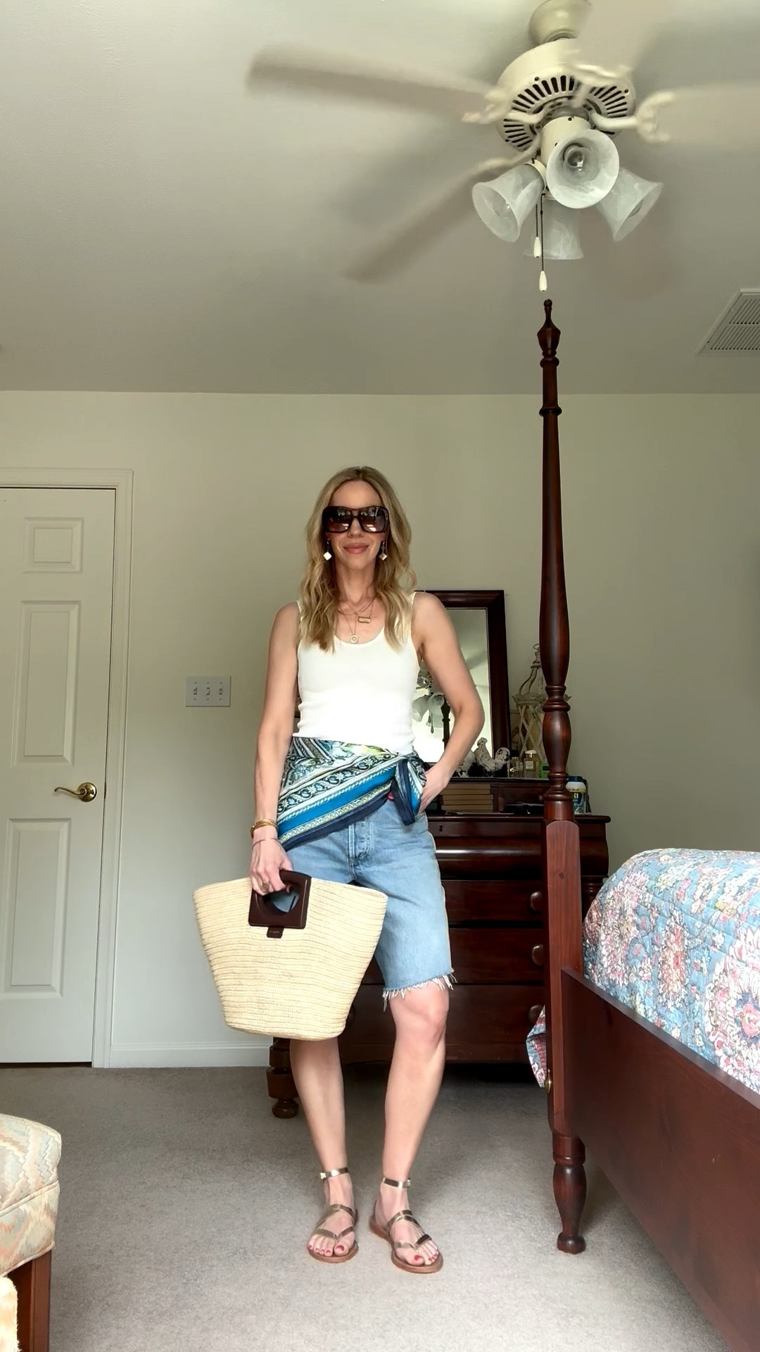 Summer vacation outfit, beach vacation, denim bermuda shorts, silk scarf tied at waist, Le Tanneur straw tote bag

#LTKSeasonal #LTKOver40 #LTKTravel
