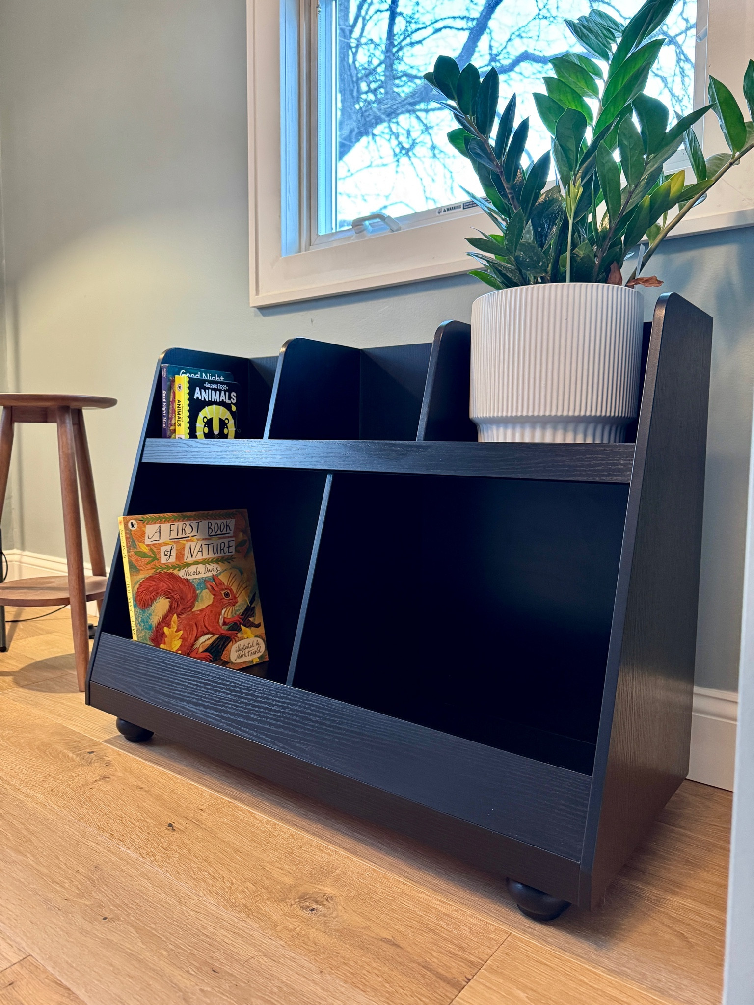 This cute bookshelf was an easy “DIY”- the bookshelf itself is from Amazon, and I swapped out the MCM style legs with 2” bun style feet for a more modern traditional look. A double coat of black gel stain gives it a sharp look. Shop what I used here, or similar options below! 


#LTKBaby #LTKHome #LTKKids