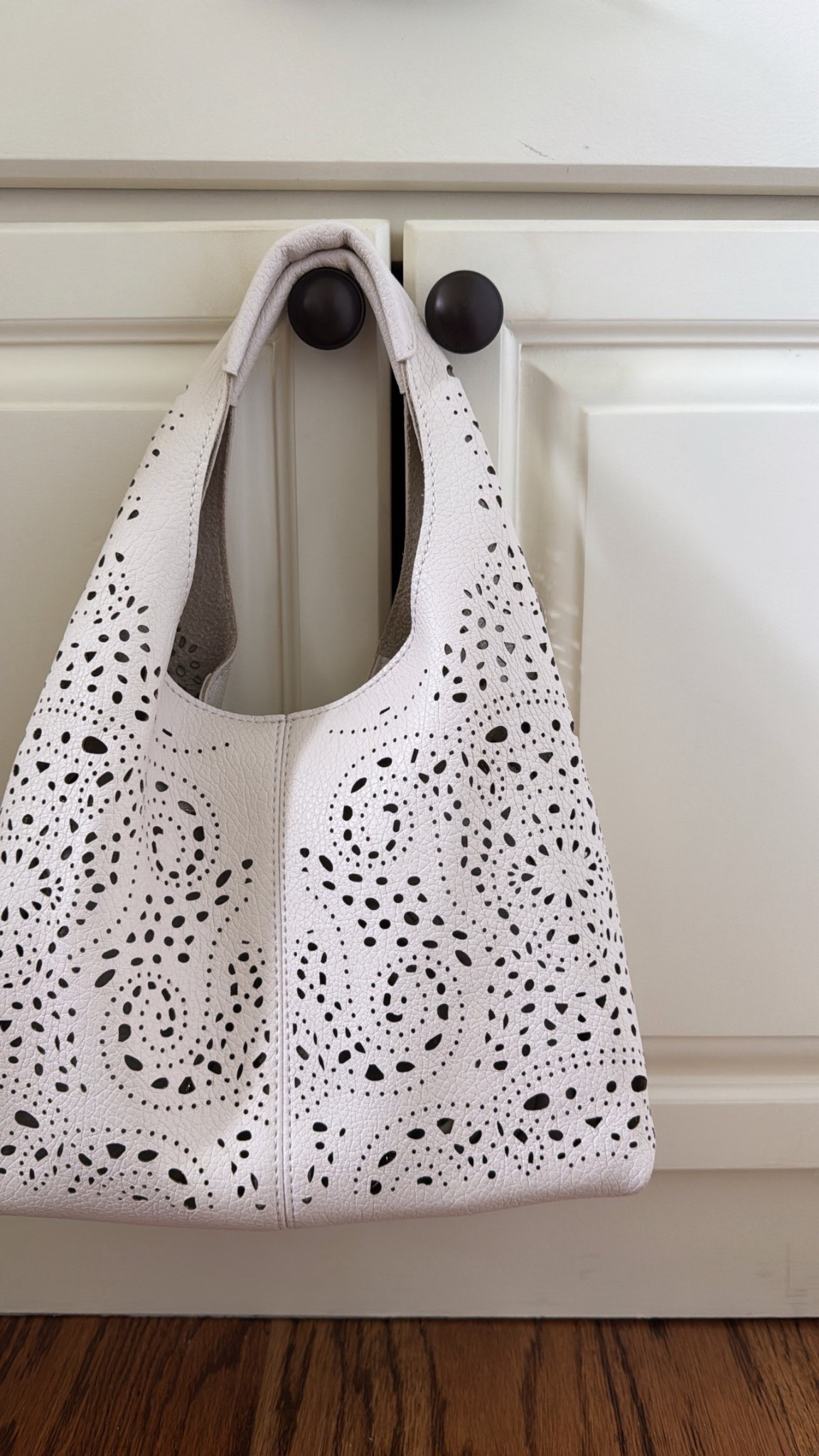 Perforated leather tote with pouch insert & crossbody strap. 4 colors. Summer bag. Anthropologie bags. @Anthropologie #anthropartner

#LTKOver40 #LTKSeasonal