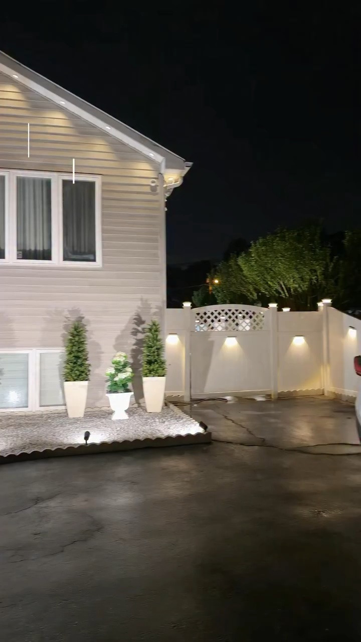 We finally finished our front yard makeover, and I couldn’t be happier with how it turned out. 🤍
We added white landscaping stone, scalloped edging, pine trees, landscape lighting, and decorative planters to completely transform this side of our home. Every project has been done one step at a time, and seeing it all come together has been so rewarding.

What would you add to your dream front yard? 
.
.
.
#diy #building #makeover #homeimprovement #momlife
